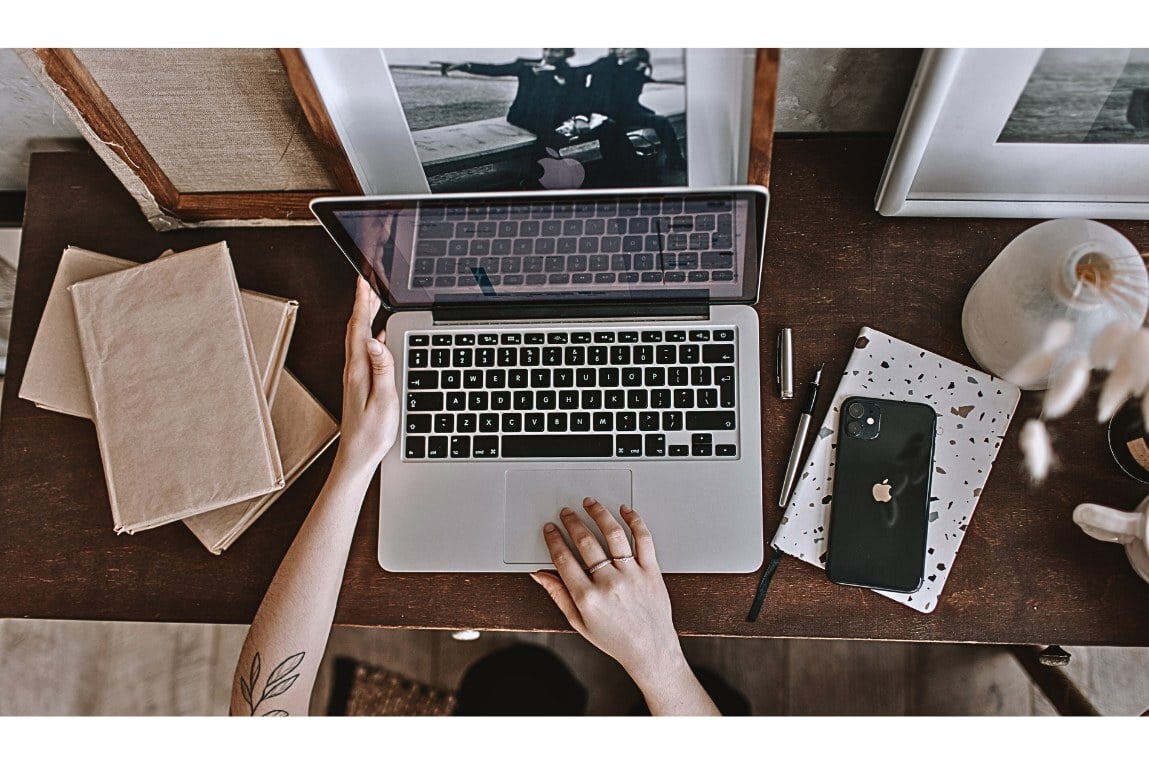 birds-eye view of an SEM agency employee working on a campaign